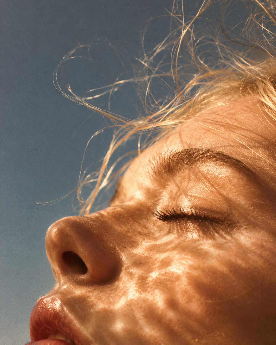 Person resting peacefully in sunlight